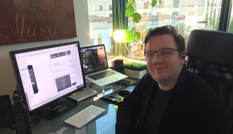 Shaun works on app design at Royall office in Orlando.